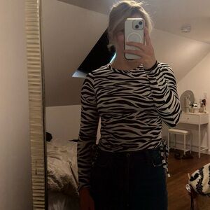 Olivia Rae Black and White Fitted Long Sleeve Bodysuit